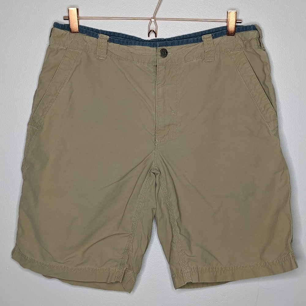 Men’s North Face tan shorts size 34.